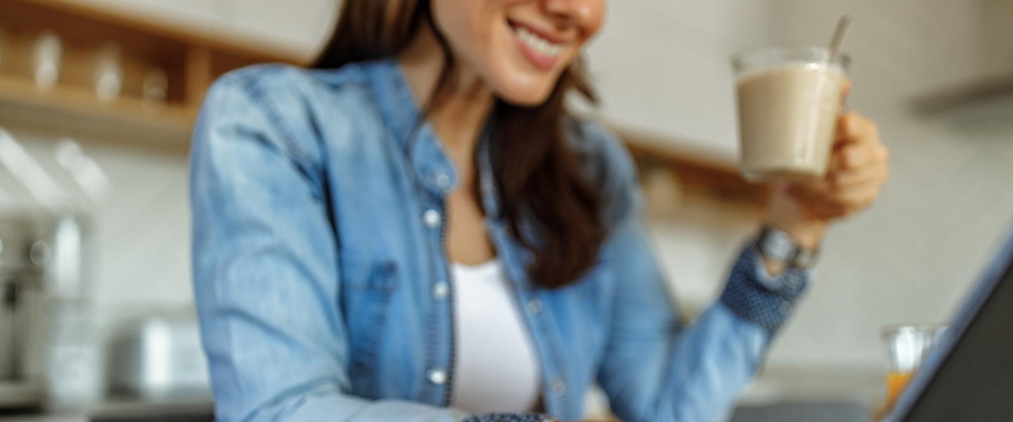 Woman online drinking a coffee